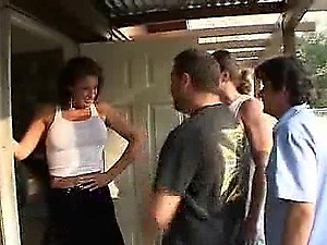 Redhead MILF Sucking Off Two Guys